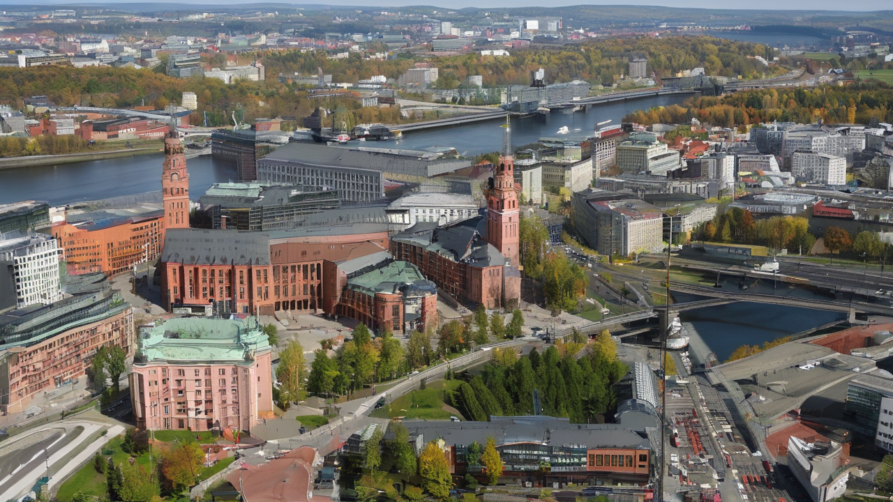 Przestronny narożnik Oslo w jasnobeżowym kolorze z poduszkami dekoracyjnymi